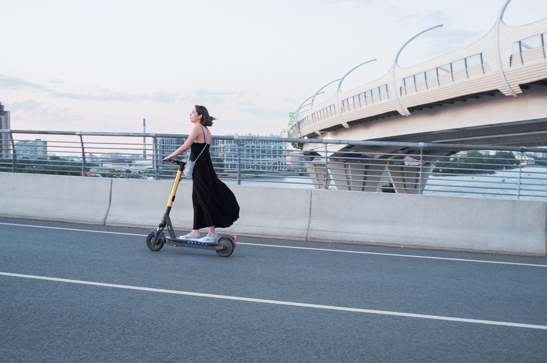 girl riding electric scooter