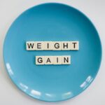 'weight gain' spelled out on a plate